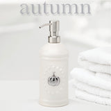 White Ceramic Soap or Lotion Dispenser with Stainless Steel and 5 Interchangeable Metal Seasonal/Decor Magnets.